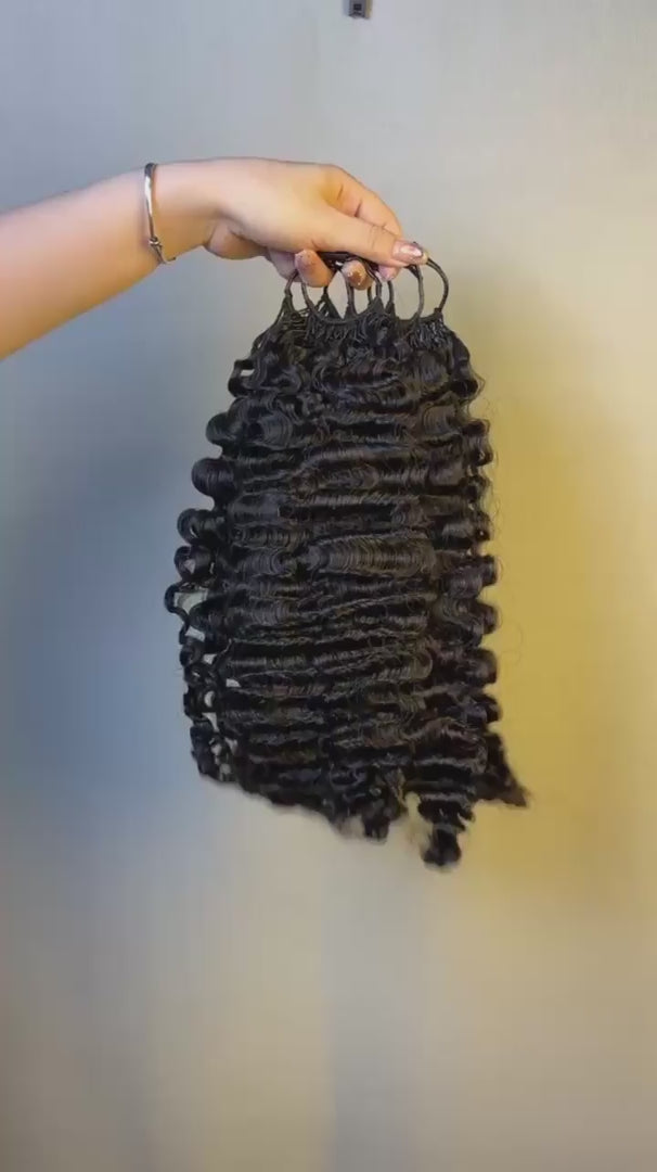 Video of #1B Loose Burmese Curly crochet raw hair extension