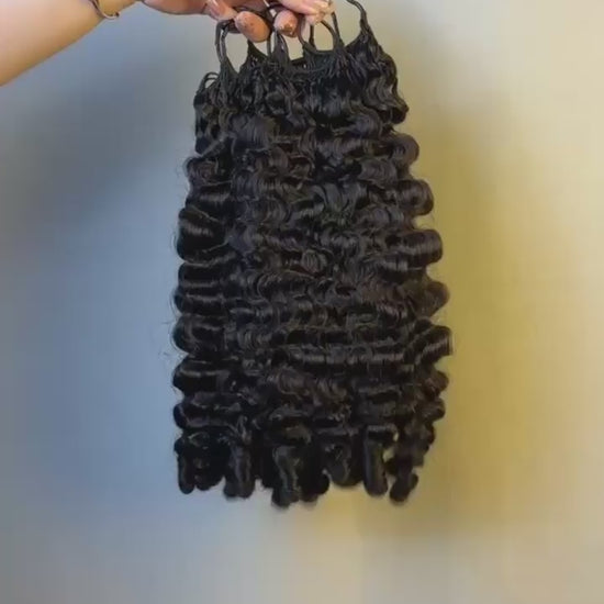 Video of #1B Hawaiian Curly crochet raw hair extension